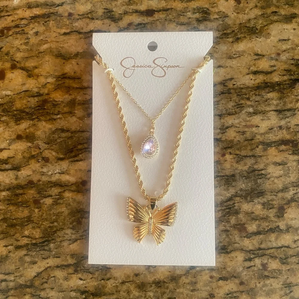 NEW Jessica Simpson gold butterfly and pink crystal necklace